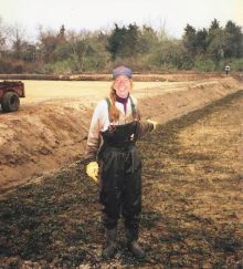 Annie's all smiles as she plants the South Bog at Annie's Crannies